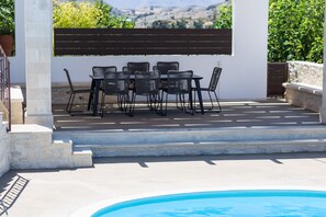 Tranquility unfold at the pool area.