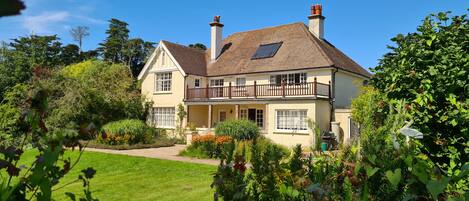 1920s Arts & Crafts house with many  restored features in large gardens