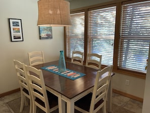 Dining area for sit down meals with lots of natural light from westerly windows.