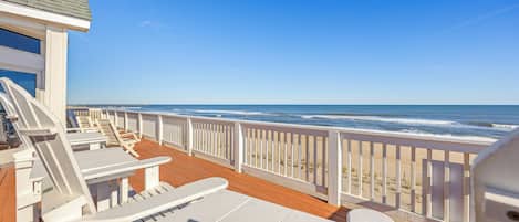 Soak up the sun at Southern Sol, a 7-bedroom oceanfront home filled with luxurious amenities.