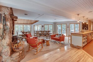 Living Room | Open Layout | Flat-screen Smart TV | Wall-to-Wall Windows