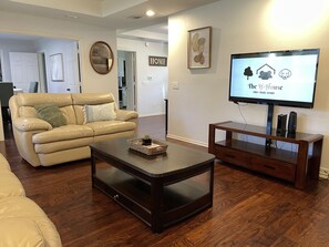 Spacious, modern, clean, and well-equipped living room.