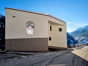 Sky, Property, Road Surface, Asphalt, Building, Window, Rural Area, Roof, Cloud, Slope