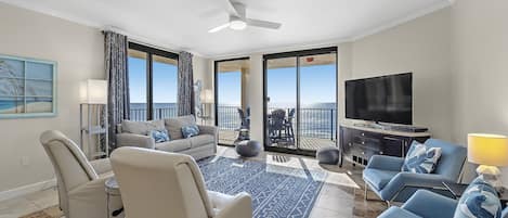 Living Room with Full Size Sleeper Sofa and Private Balcony with Views of the Gulf of Mexico