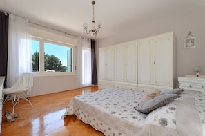 Romantic bedroom with stunning sea view . Mar deLuxe apartment no.1 .