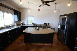 Our fully furnished kitchen with eco-friendly modern appliances.