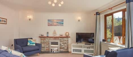 Trevells, Roserrow. First floor: Sitting area with a smart television