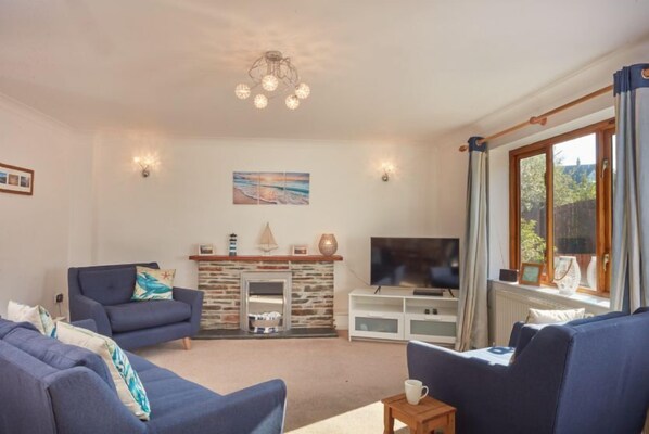Trevells, Roserrow. First floor: Sitting area with a smart television