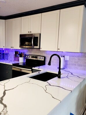 Newly remodeled with beautiful quartz countertops.