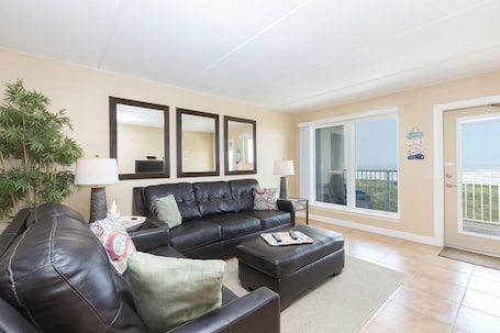 The rich, deep comfort of our study-like furnishings delightfully contrast the sun-kissed feeling streaming through our huge living space windows.