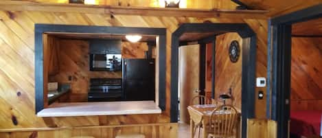 Cozy cabin with pine walls and ceilings. 