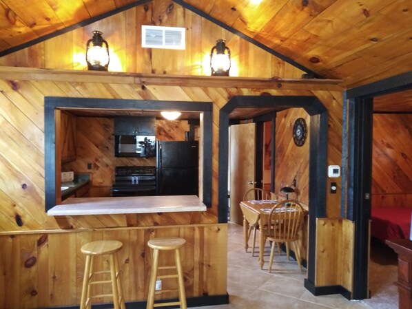 Cozy cabin with pine walls and ceilings. 