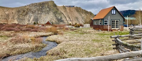 Cabin and creek in yard