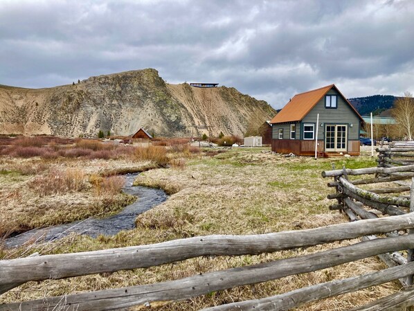 Cabin and creek in yard