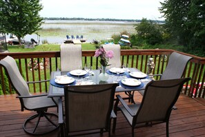 Main deck has umbrella table for 6, can add more. BBQ is on deck. 