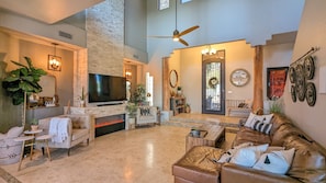 Large living room with plenty of seating. Big TV. Relax by electric fireplace!