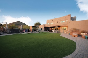 Humongous backyard. So much seating. Gas firepit. Pool.