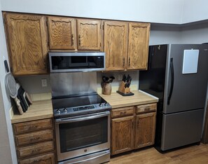 Stainless steel glass top oven w/ convection, microwave, & bottom freezer fridge