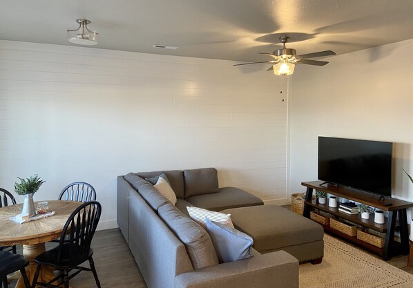 Roku TV, living room and dining area.