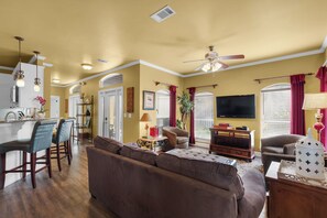 Coconut Cove - Living Area w/ HDTV and Queen Sleeper Sofa