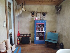 Rustic stucco finished walls, antique toiletries cabinet, stocked of course! 