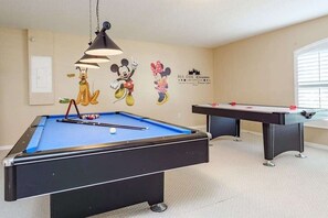 Themed Game Room with Pool Table and Air Hockey