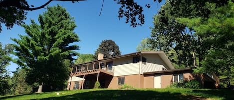 A large deck and covered patio overlooking the Coulee Bluffs