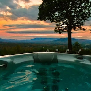 Enjoy the private outdoor hot tub with stunning views