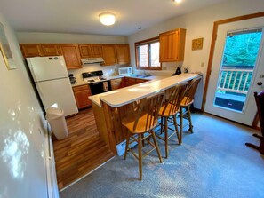 There's also a cozy breakfast bar that seats 4!