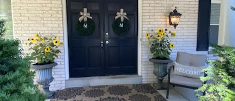 Nice large welcoming porch. Perfect for having a morning coffee and reading.