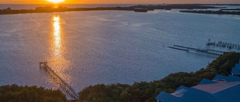 Aerial view of fishing pier and sunset over Casey Key
