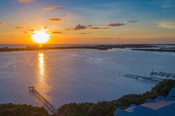 Aerial view of fishing pier and sunset over Casey Key
