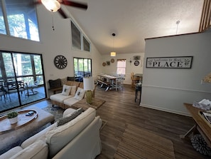 Open first floor area. Dining table and bar can comfortably seat 10!