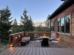 Let the kids play in the Water and sand table while relaxing by the fire pit