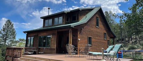 Can you imagine hanging out on our expansive deck? Fire pit grill lounge chairs