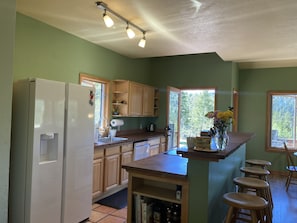 Kitchen stocked w/ everything you need for preparing meals.