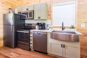 Kitchen With Stainless Appliances And Quartz Countertops!