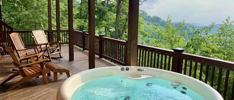 Bask in your private hot tub and enjoy the views!