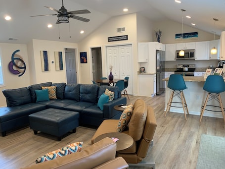 Open living room with high ceiling