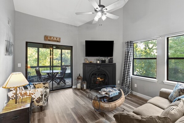 Bright & Clean Living Room just off the Dining Area has a Flat Screen TV 