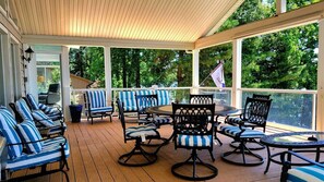 Relax in comfort on the covered porch with your favorite beverage and snack