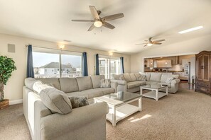 Top-Level Living Room with Deck Access