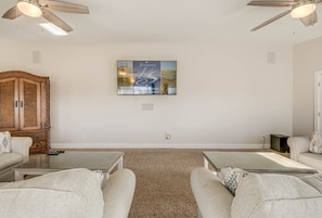 Top-Level Living Room with Deck Access