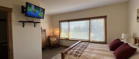 The Master Bedroom with Queen Bed and ensuite Full Bathroom.