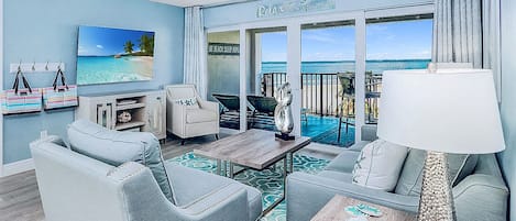 Elegant coastal decor with an electric recliner and seating for five.