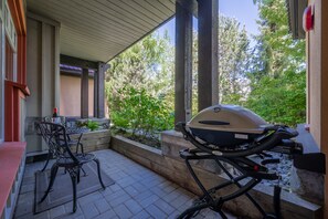 Patio #1 - Seating area for two, Weber propane BBQ, beautiful garden view.