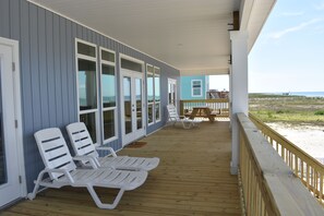 Plenty of room on back porch to relax and enjoy the view.