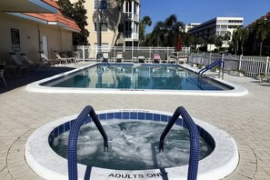 55 & over heated community pool and hot tub!  Grab a book and a bottled water and relax!!