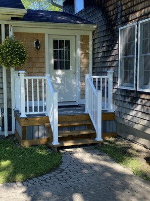 Entrance to breezeway, kitchen and back deck.