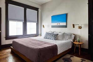 The master bedroom offers a king-sized bed. With a perfectly balanced memory foam mattress and supple sheets, you'll sleep like a dream!